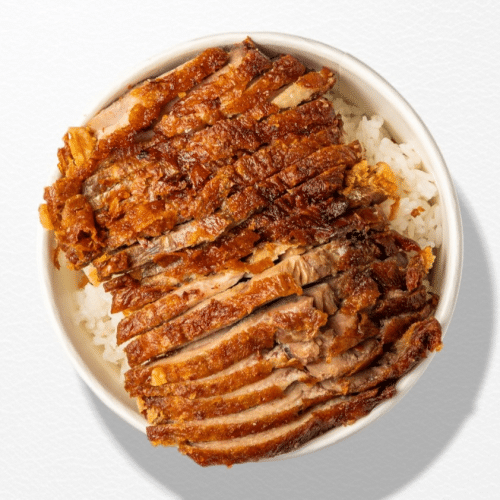 Reis mit knusprigem Entenfleisch