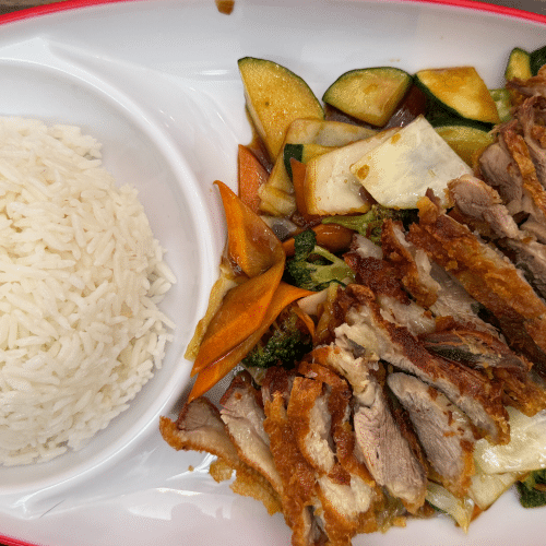 Ente mit Wokgemüse , dazu Reis