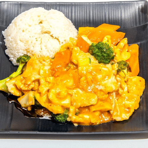 Huhn mit Wokgemüse in Currysauce , dazu Reis