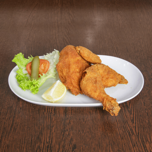 Halbes Backhuhn mit Beilage nach Wahl